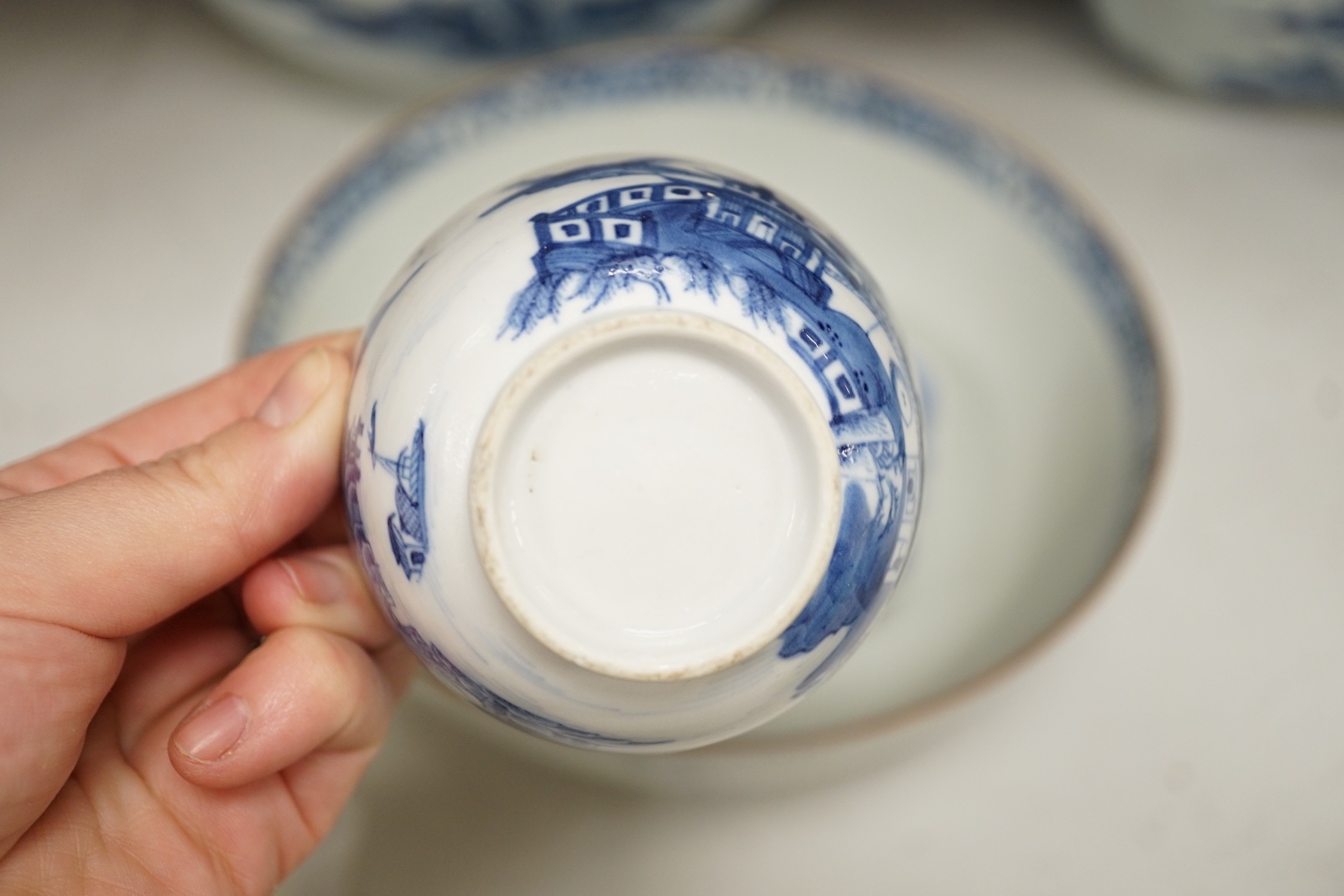 A selection of 18th century blue and white Chinese export bowls and dishes, largest 31cm diameter